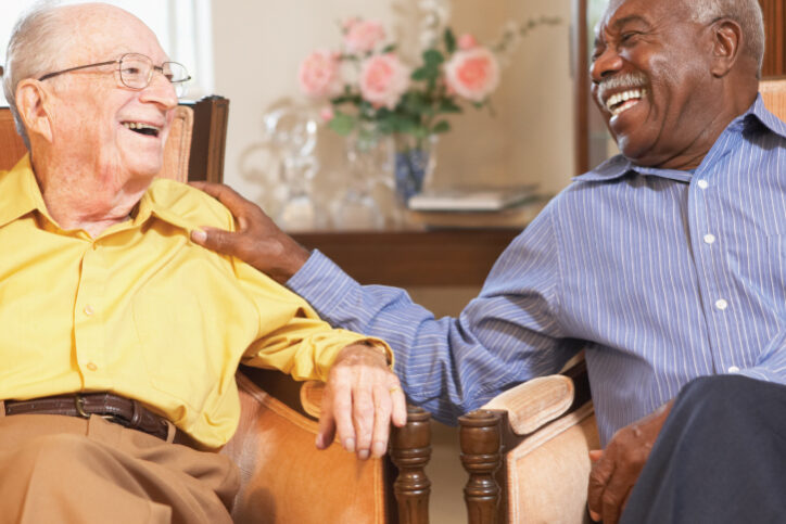 Senior men chatting in the common area